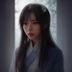 核验台合规顾问吴静怡，女性，办公室环境，手持文件审阅内容合规性，表情认真